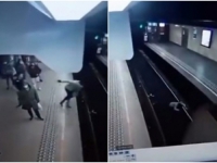 ZASTRAŠUJUĆI SNIMAK: Gurnuo ženu na šine, za sekundu izbjegnuta tragedija (VIDEO)