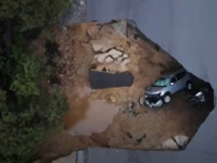 APOKALIPTIČNI PRIZORI IZ AMERIKE: Vozila u Los Angelesu propala kroz ogromnu rupu na cesti, broj žrtava olujnog nevremena narastao na 17 (VIDEO)