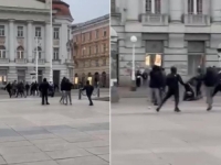 VEĆA GRUPA MASKIRANIH OSOBA NAPALA MOMKA NA TRGU BANA JELAČIĆA U ZAGREBU: 'Ljudi gledaju, policije nigdje'