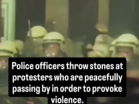 SKANDALOZAN SNIMAK IZ BEOGRADA: Pogledajte trenutak kada policajac krupnim kamenom gađa demonstrante! (VIDEO)