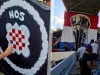MURAL KOJI JE PODIGAO PRAŠINU PONOVO JE NA ZIDU: Armada i branitelji obnovili uklonjeni grb HOS-a