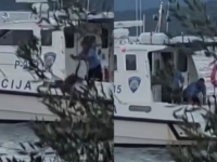 ŠTA SE ZAISTA DOGODILO: Policajca snimili kako baca psa u more, poznati detalji koji su uznemirili javnost (VIDEO)